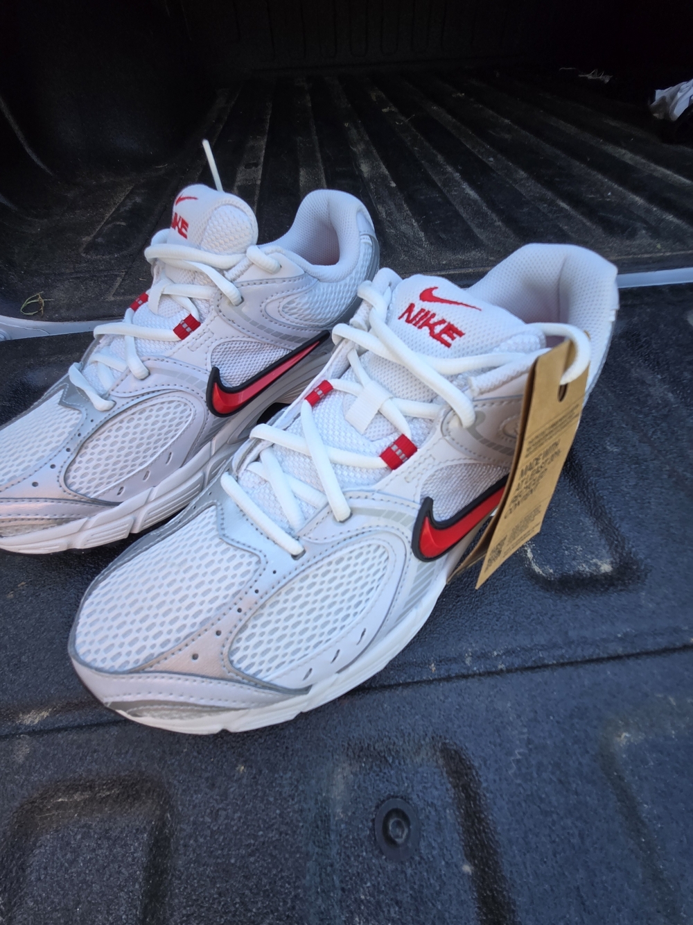 Nike Men's White Running Shoes with Red Accent